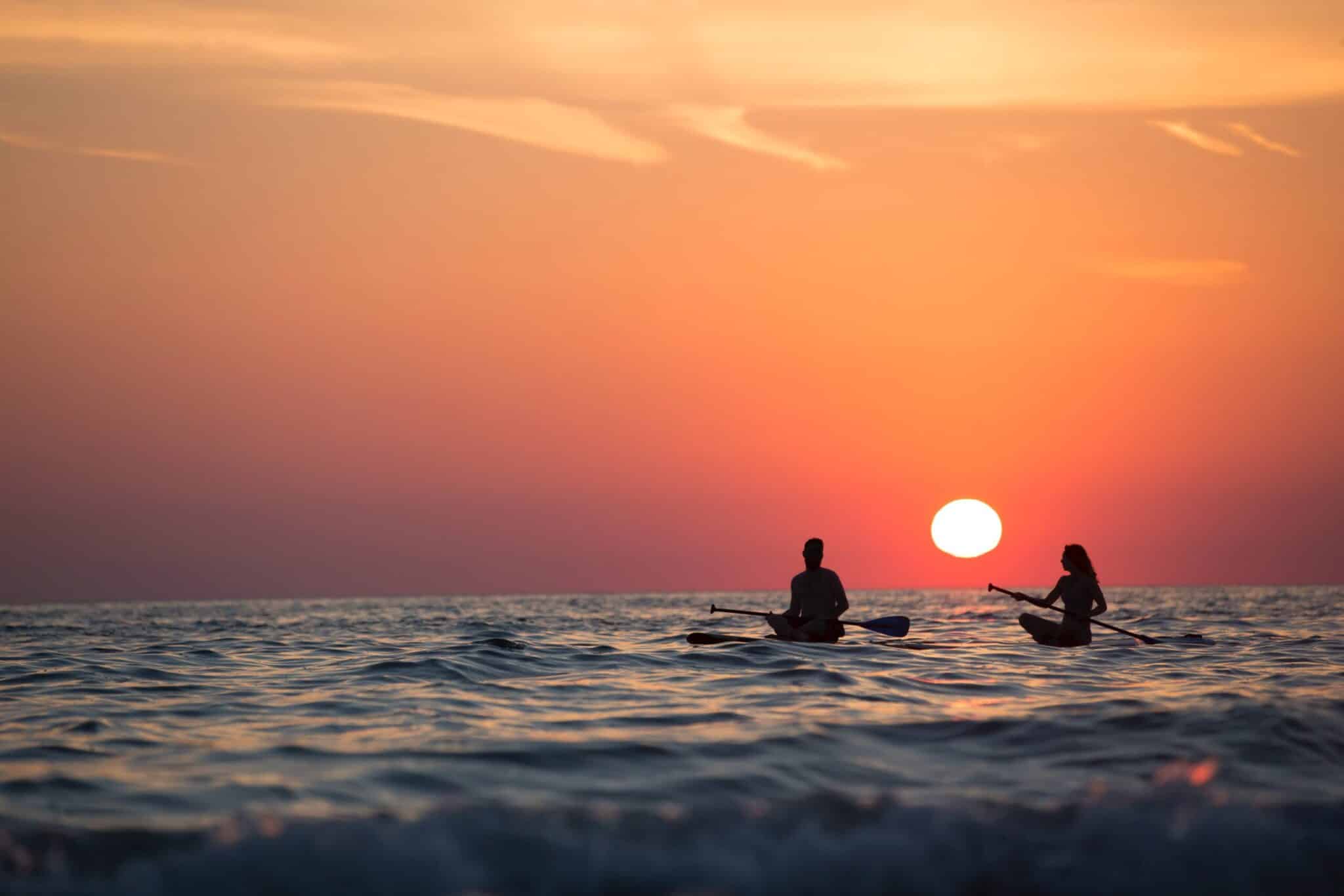 a sunset over some water